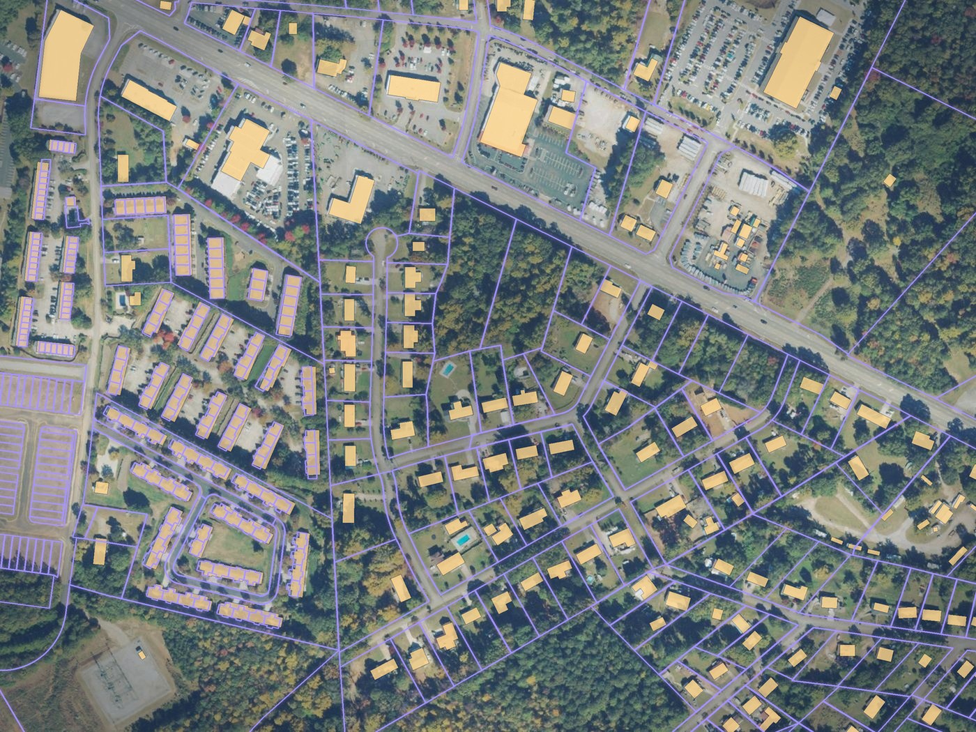 Aerial with building footprints filled and parcel boundaries drawn over them